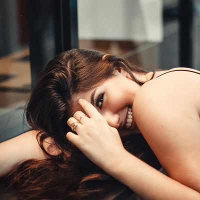 Portrait photo of Olga Zariczna, smiling warmly.